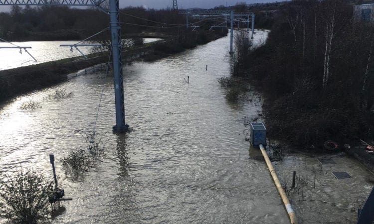 Storm Dennis is continuing to cause transport chaos as train lines and roads are blocked by flooding and fallen trees.